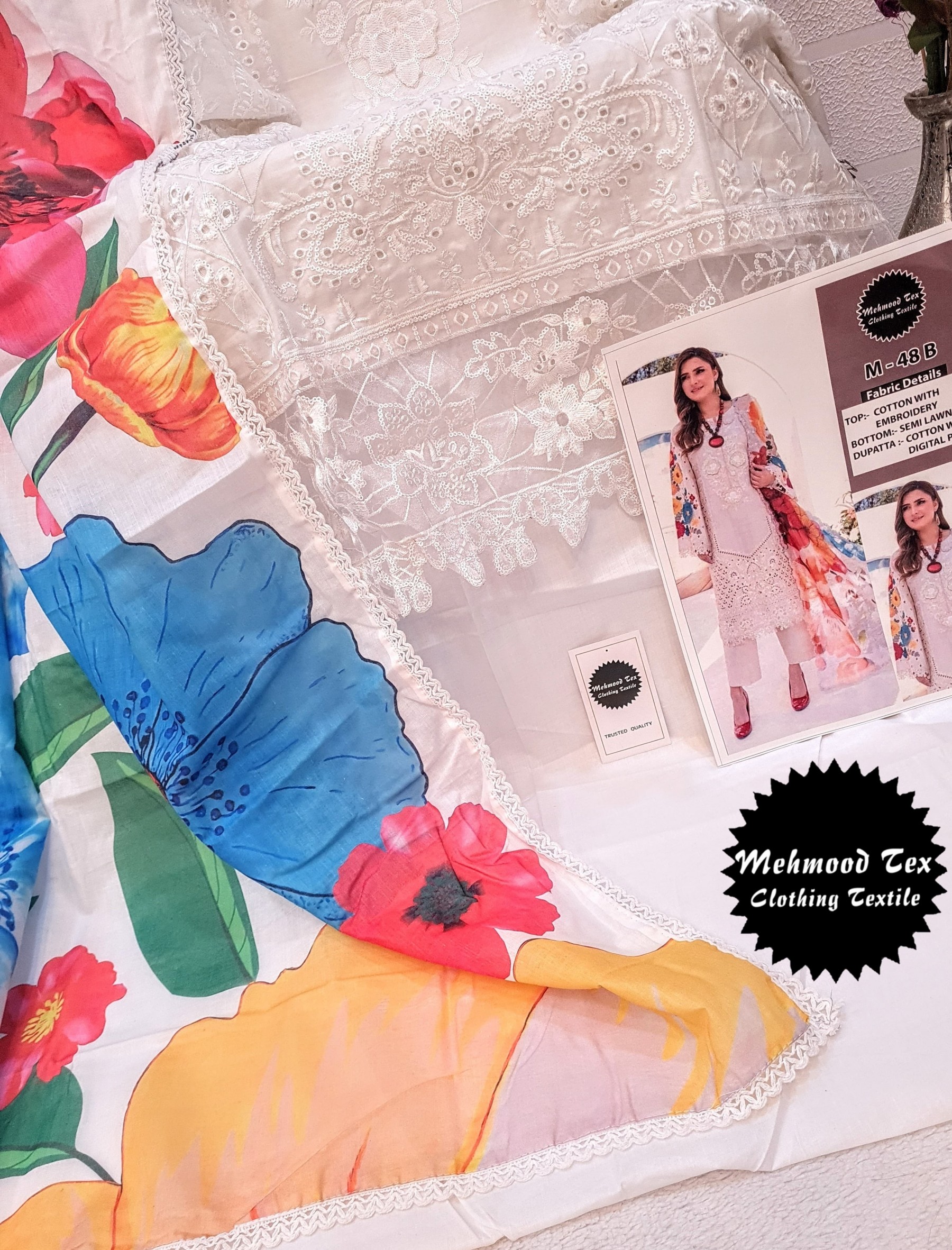 MEHDOOD TEX M 48 PAKISTANI COTTON WITH  HEAVY EMBROIDERY AND 3D FLOWER WORK SUIT