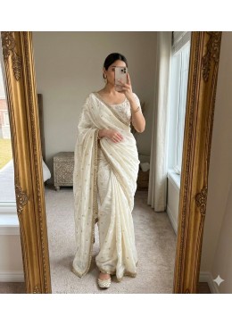 Ivory Muse: Mirror Work Border ane Floral Embroidery Designer Saree